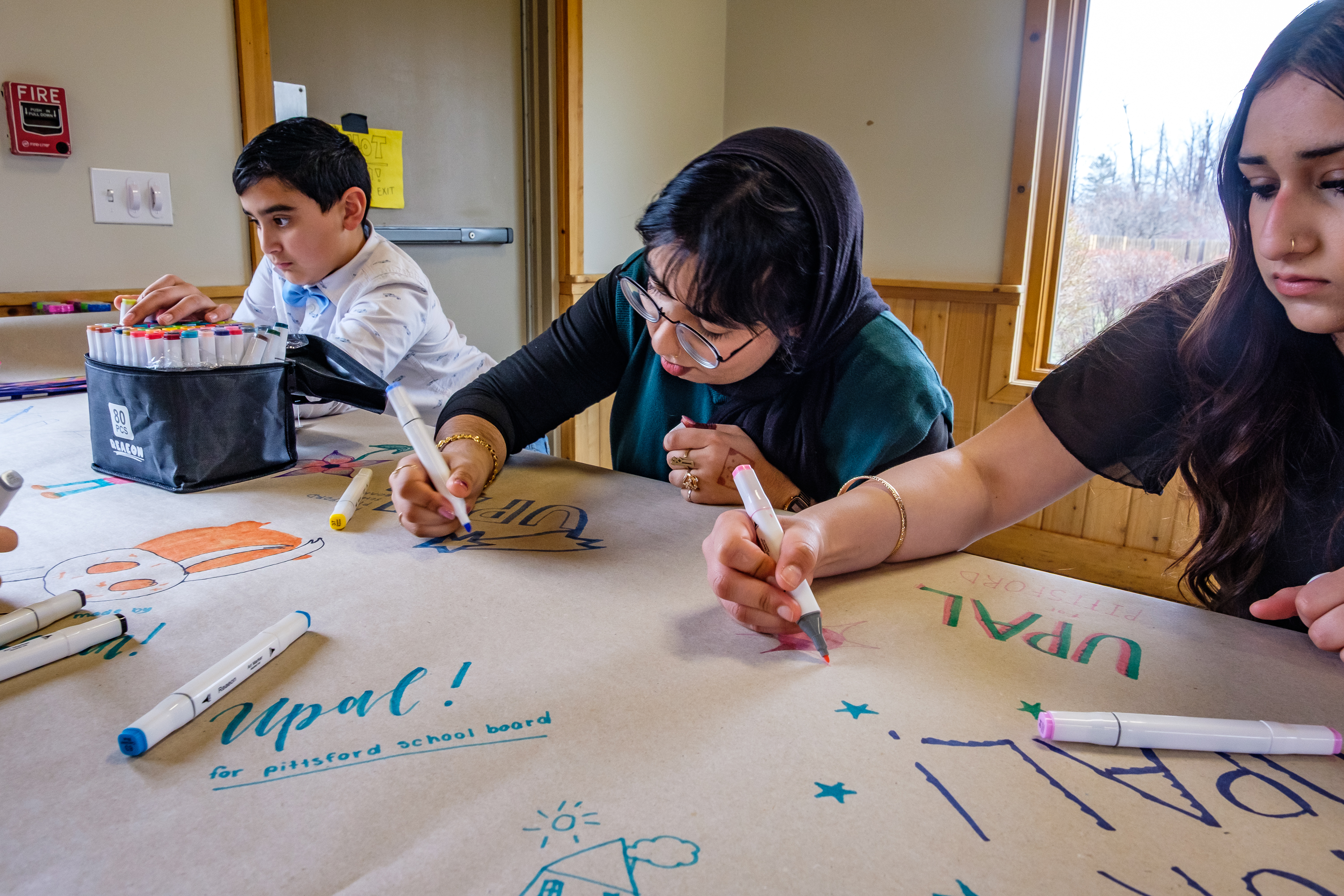 Young supporters making campaign art